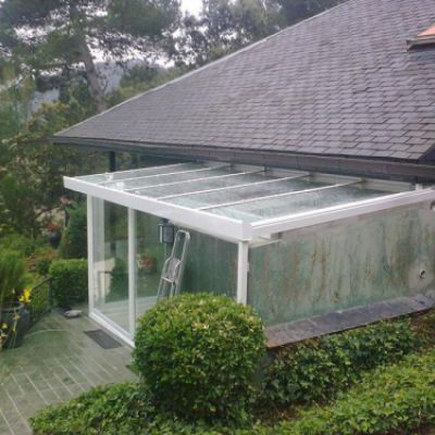 Rotura de puente térmico con vidrios laminados y cámaras